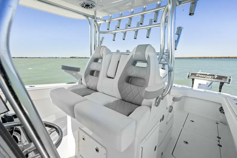  Yacht Photos Pics 2022 Freeman 34VH boat interior with luxurious seating and rod holders.
