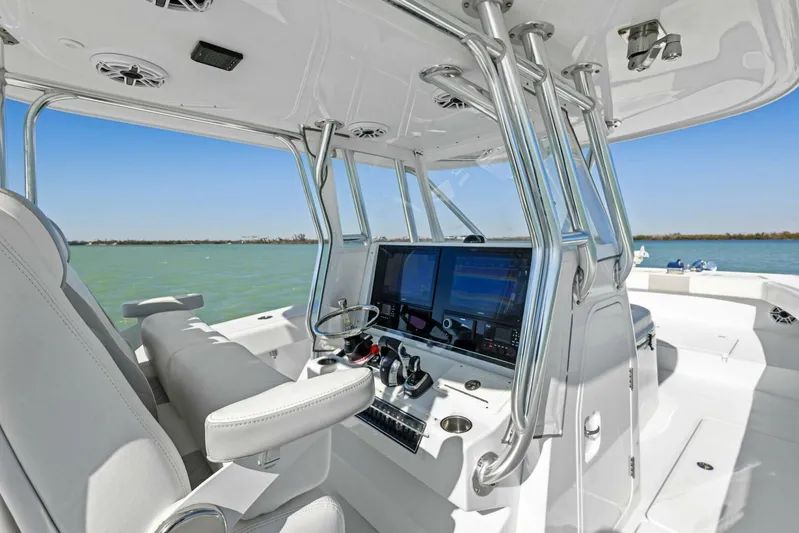  Yacht Photos Pics 2022 Freeman 34VH boat interior with modern navigation system and sleek design.