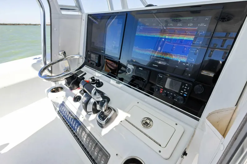  Yacht Photos Pics Control panel of 2022 Freeman 34VH boat with advanced navigation screens.