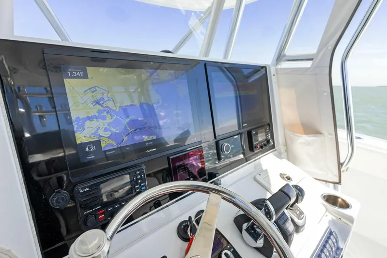  Yacht Photos Pics Freeman 34VH 2022 boat dashboard with navigation screens and controls.