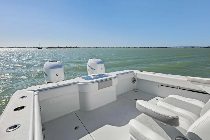  Yacht Photos Pics Freeman 34VH 2022 boat on water, featuring spacious deck and dual engines.