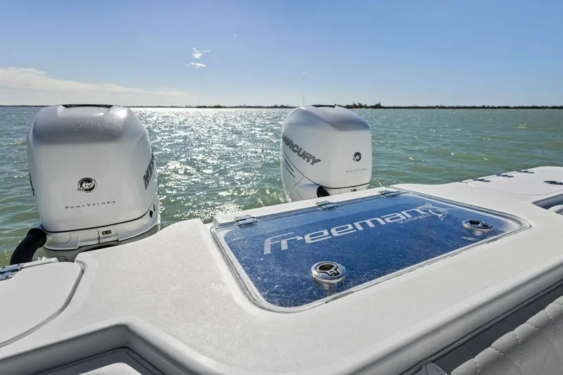  Yacht Photos Pics Freeman 34VH 2022 boat with dual Mercury engines on open water.