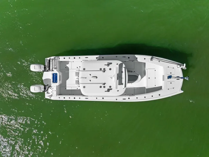  Yacht Photos Pics Aerial view of 2022 Freeman 34VH boat on green water.