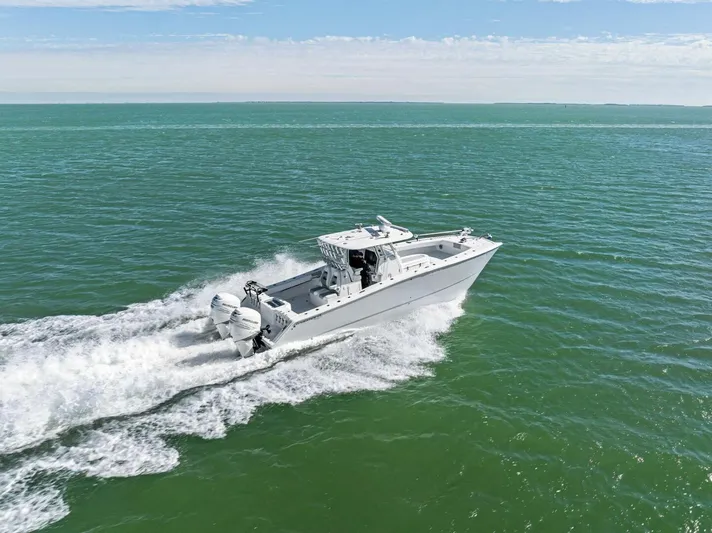  Yacht Photos Pics 2022 Freeman 34VH boat cruising on open water.