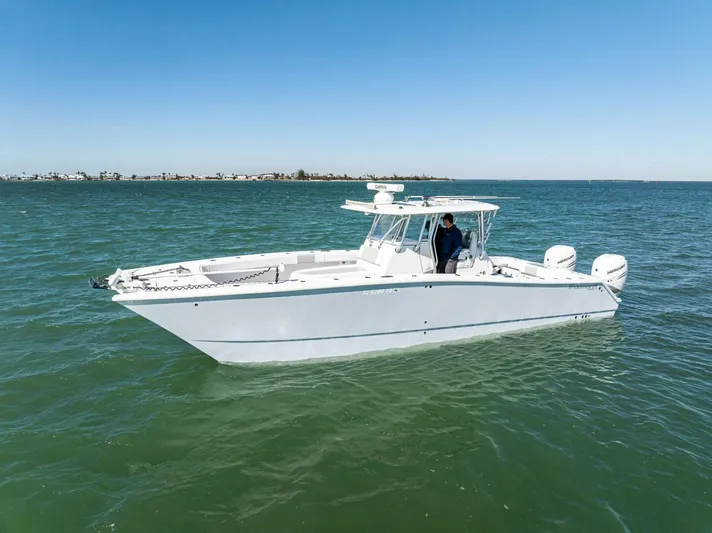  Yacht Photos Pics 2022 Freeman 34VH boat on open water under clear blue sky.
