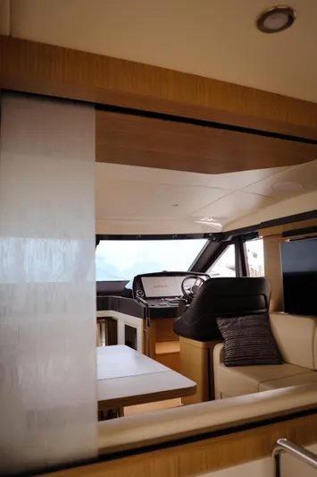 Low Key Yacht Photos Pics Interior view of 2019 Absolute 50 Fly yacht, featuring modern design and luxurious seating.
