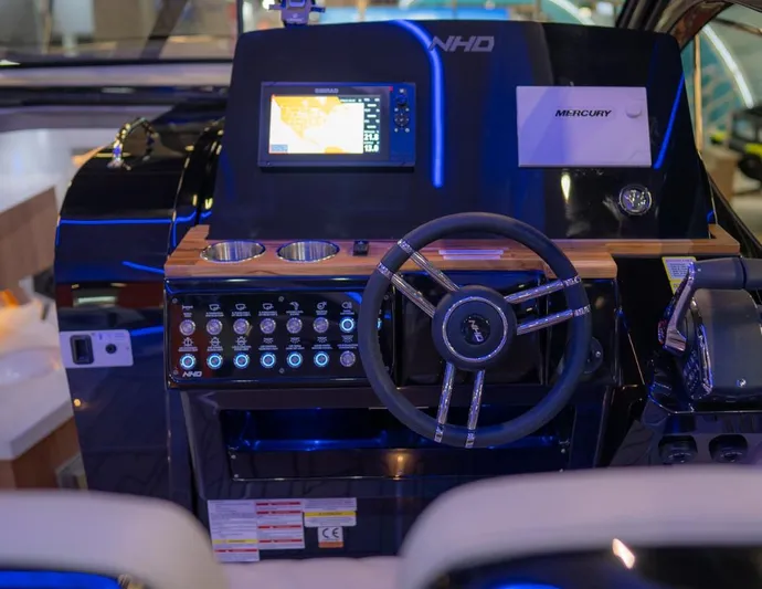  Yacht Photos Pics Control panel of NHD 355 All Space boat, 2025 model, featuring advanced navigation system and steering wheel.