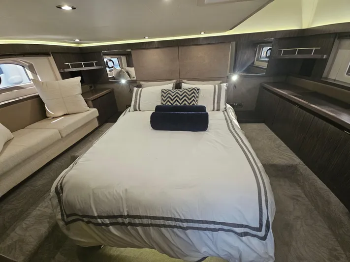 Just M Yacht Photos Pics Luxurious bedroom interior of 2018 Sea Ray Fly 460 yacht with elegant bedding and modern design.