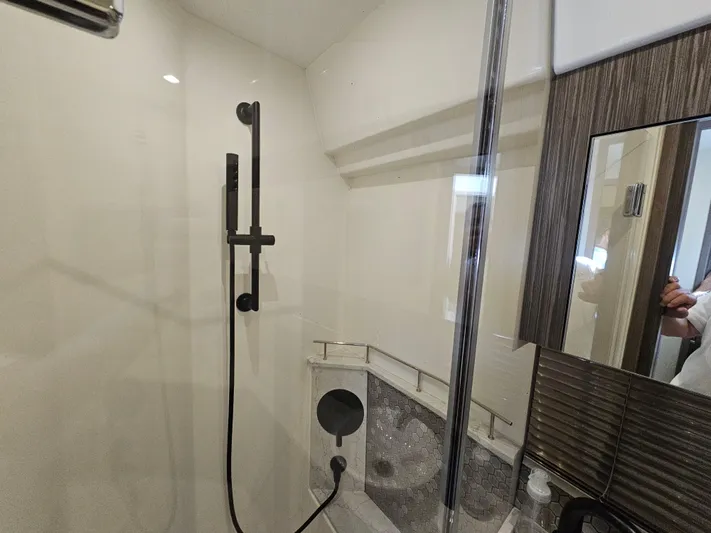 Just M Yacht Photos Pics Modern shower in 2018 Sea Ray Fly 460 yacht, featuring sleek fixtures and elegant design.