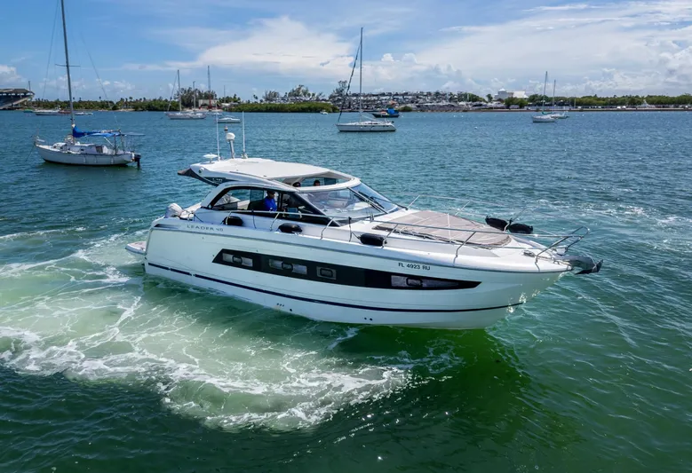  Yacht Photos Pics 2019 Jeanneau Leader 40 yacht cruising on a sunny day in open waters.