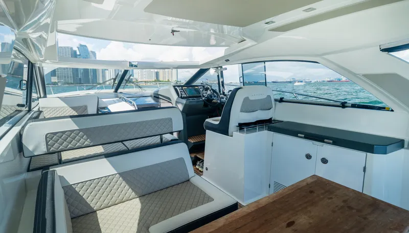  Yacht Photos Pics Interior of 2019 Jeanneau Leader 40 yacht with modern seating and ocean view.