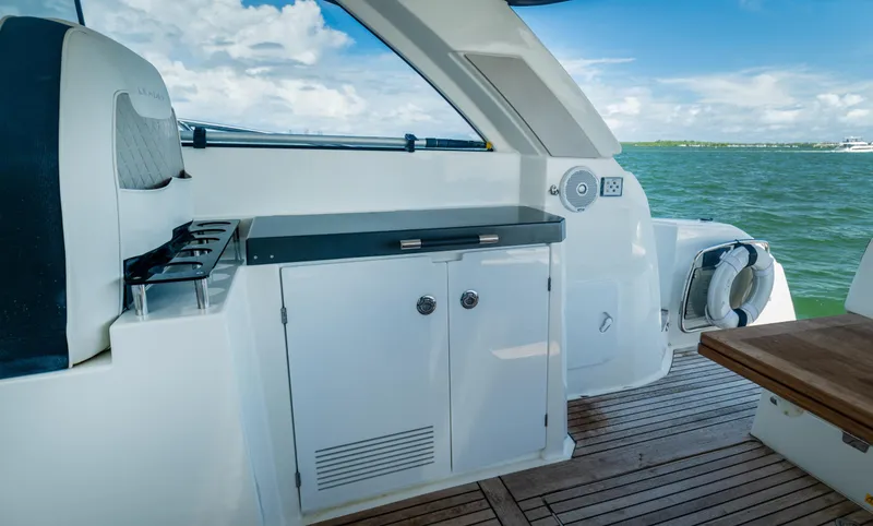  Yacht Photos Pics 2019 Jeanneau Leader 40 yacht interior with sleek cabinetry and ocean view.