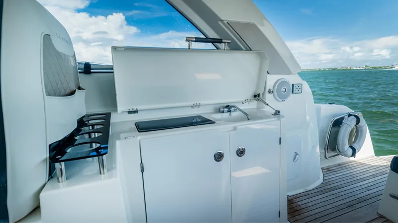  Yacht Photos Pics Outdoor kitchenette on 2019 Jeanneau Leader 40 yacht with ocean view.