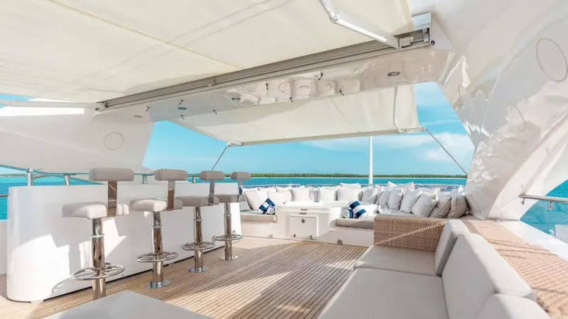 Mercy Yacht Photos Pics Luxurious Sunseeker 37 Metre Yacht 2009 with elegant outdoor seating and bar area.