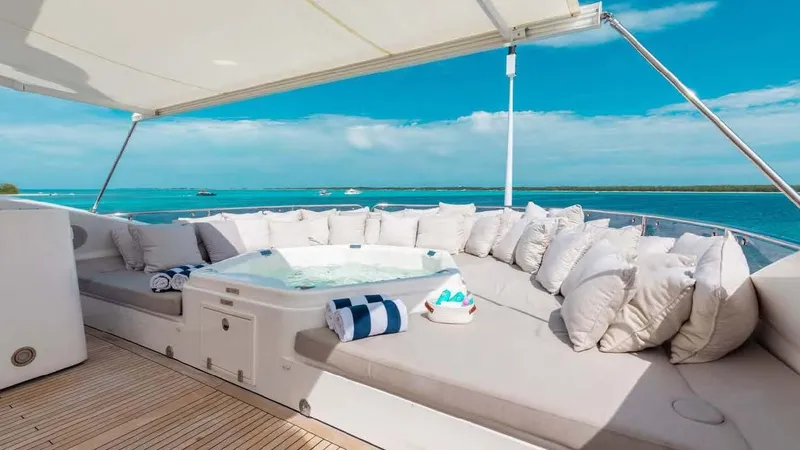 Mercy Yacht Photos Pics Luxurious Sunseeker 37 Metre Yacht deck with jacuzzi, plush seating, and ocean view, 2009 model.