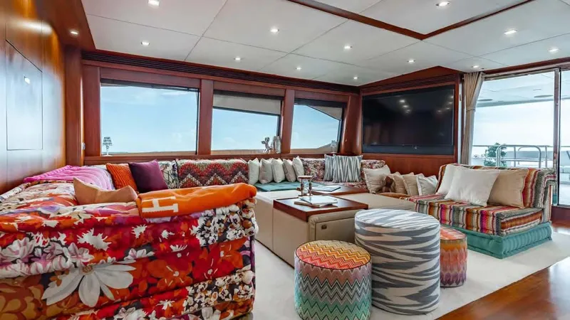 Mercy Yacht Photos Pics Luxurious Sunseeker 37 Metre Yacht 2009 interior with vibrant seating and large windows.