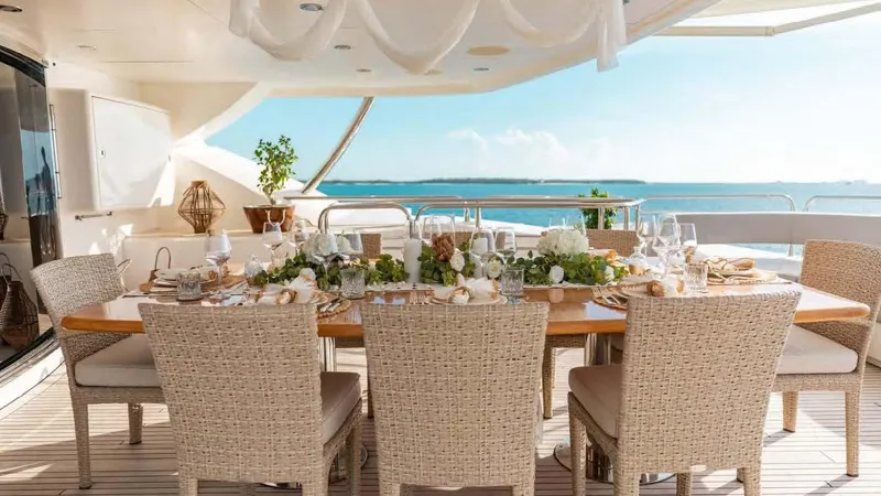 Mercy Yacht Photos Pics Luxurious dining setup on 2009 Sunseeker 37 Metre Yacht with ocean view.