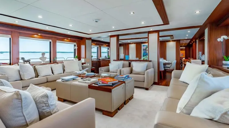 Mercy Yacht Photos Pics Luxurious interior of 2009 Sunseeker 37 Metre Yacht with elegant seating and panoramic windows.