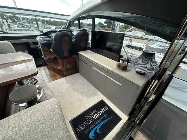  Yacht Photos Pics Princess V50 - 3 Cabin Layout - Saloon entertainment unit