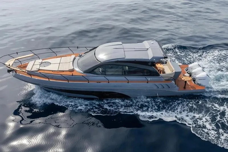  Yacht Photos Pics 2026 Hanover 415 Ultimate Luxury yacht cruising on open water, showcasing sleek design and elegance.