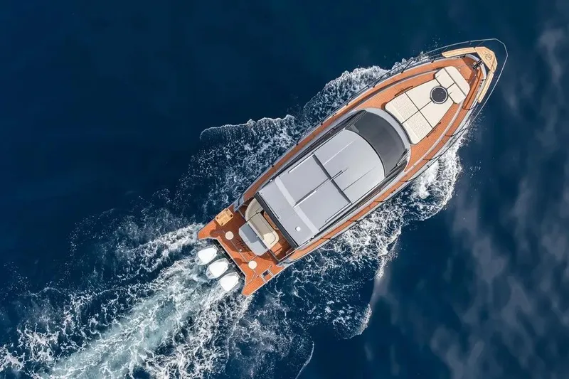  Yacht Photos Pics Aerial view of 2026 Hanover 415 Ultimate Luxury yacht cruising on open water.