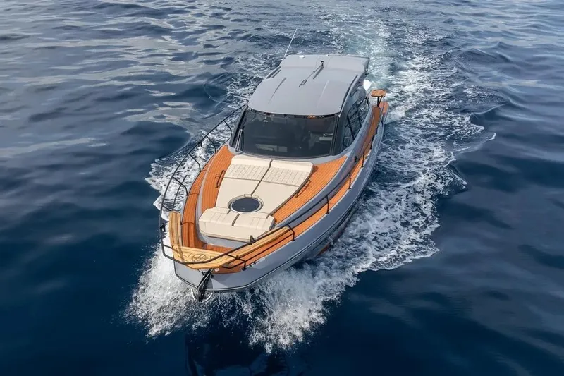  Yacht Photos Pics 2026 Hanover 415 Ultimate Luxury yacht cruising on open water, showcasing sleek design.