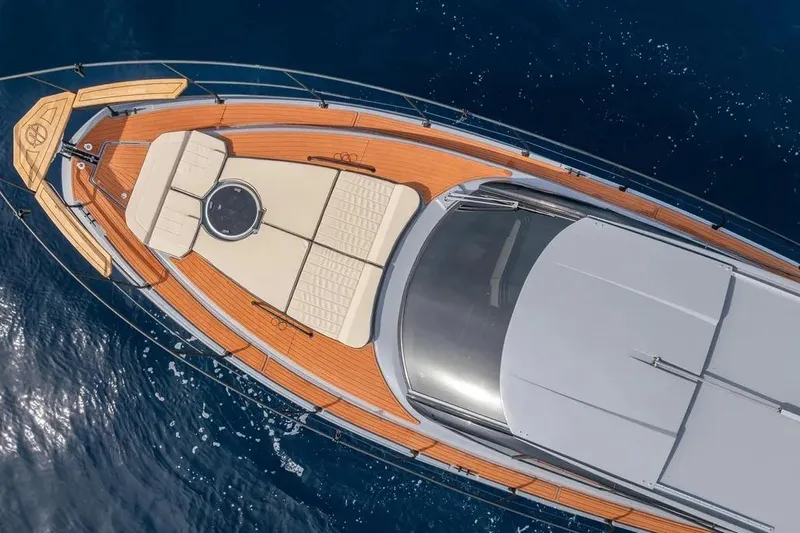  Yacht Photos Pics Aerial view of 2026 Hanover 415 Ultimate Luxury yacht on blue ocean water.