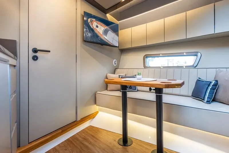  Yacht Photos Pics Luxurious interior of 2026 Hanover 415 Ultimate Luxury yacht with elegant seating and modern decor.