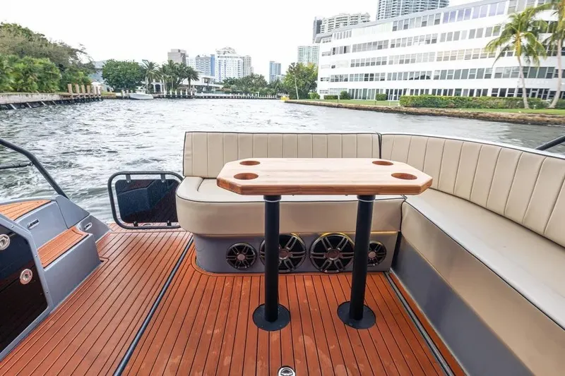  Yacht Photos Pics Luxurious Hanover 415 Ultimate boat interior with elegant seating and wooden table, 2026 model.