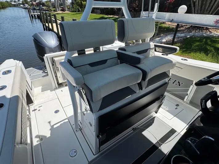  Yacht Photos Pics 2021 Blackfin 272 CC boat interior with dual seating and sleek design.