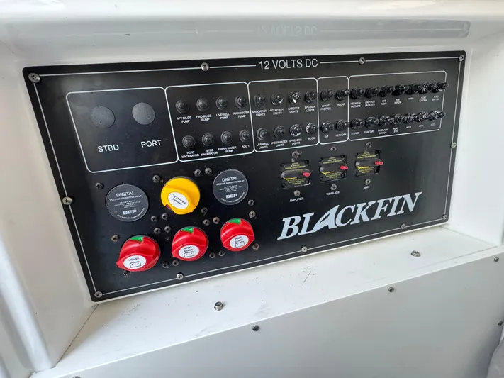 Yacht Photos Pics 2021 Blackfin 272 CC control panel with switches and circuit breakers.
