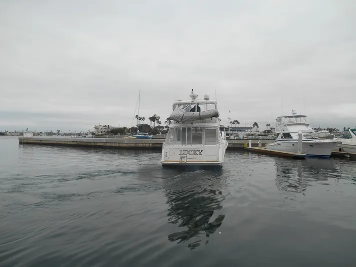 Lucky Yacht Photos Pics 2001 Californian 39 yacht named "Lucky" docked in a marina.