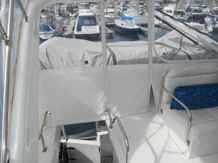 Lucky Yacht Photos Pics Californian 39 yacht interior, 2001 model, with marina view in the background.