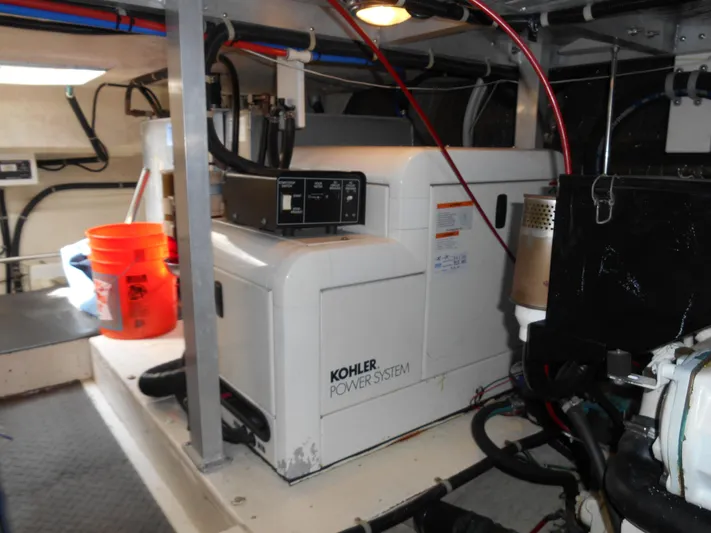 Lucky Yacht Photos Pics Engine room of a 2001 Californian 39 with Kohler power system and equipment.