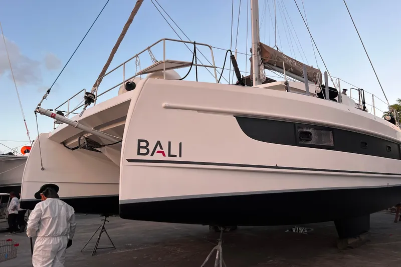 Tamboo Yacht Photos Pics 2023 Bali 4.2 catamaran on dry dock, showcasing sleek design and modern features.