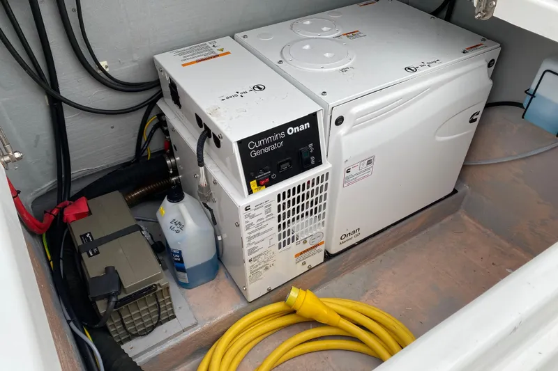 Tamboo Yacht Photos Pics Cummins Onan generator in a 2023 Bali 4.2 yacht engine compartment.