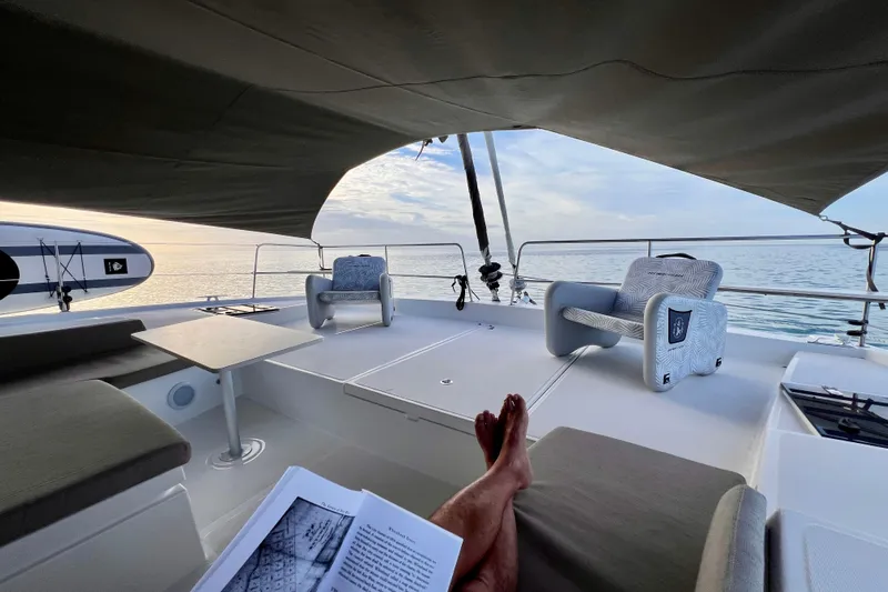 Tamboo Yacht Photos Pics Luxurious Bali 4.2 yacht interior, 2023 model, with ocean view and relaxing seating area.