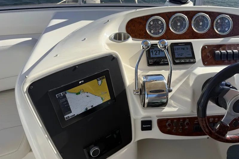  Yacht Photos Pics 2004 Meridian 411 Sedan dashboard with navigation and control instruments.