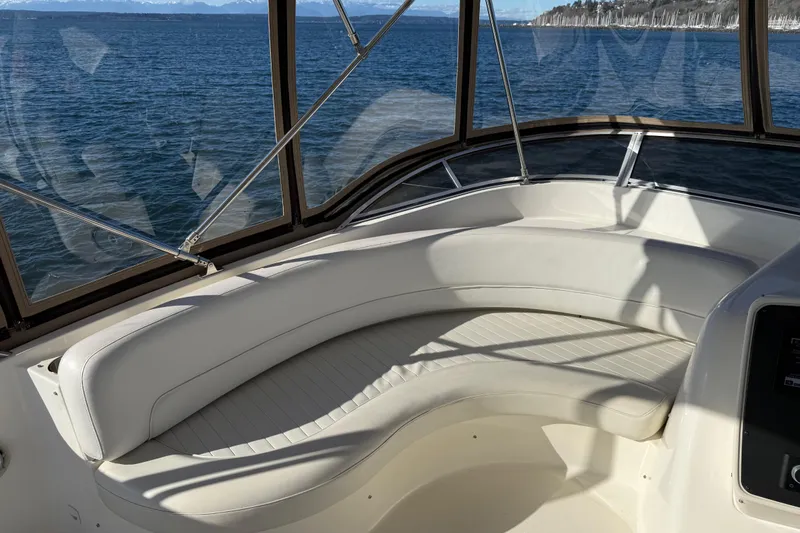 Yacht Photos Pics Luxurious seating area on a 2004 Meridian 411 Sedan yacht with ocean view.