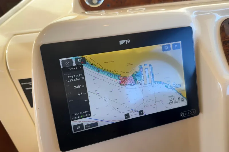  Yacht Photos Pics Navigation display on 2004 Meridian 411 Sedan showing coordinates and speed.