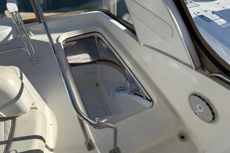  Yacht Photos Pics 2004 Meridian 411 Sedan yacht interior with open hatch and seating area.