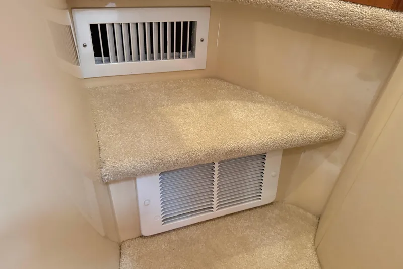  Yacht Photos Pics Carpeted interior step with vents in a 2004 Meridian 411 Sedan.
