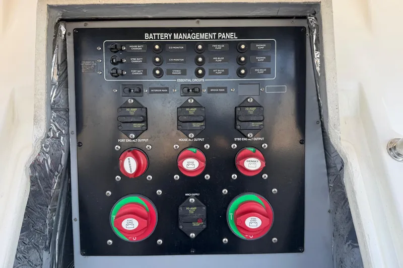  Yacht Photos Pics Battery management panel on 2004 Meridian 411 Sedan yacht, featuring various switches and controls.