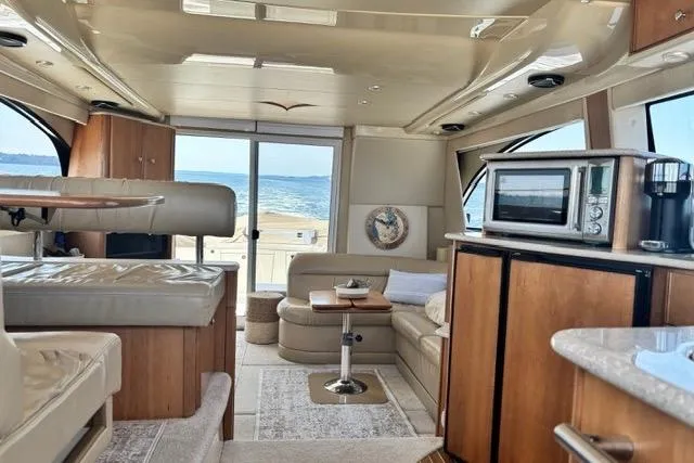  Yacht Photos Pics Luxurious interior of a 2004 Meridian 411 Sedan yacht with ocean view.