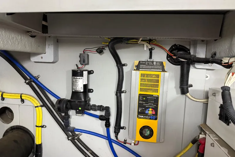  Yacht Photos Pics Electrical and plumbing components inside a 2004 Meridian 411 Sedan boat.