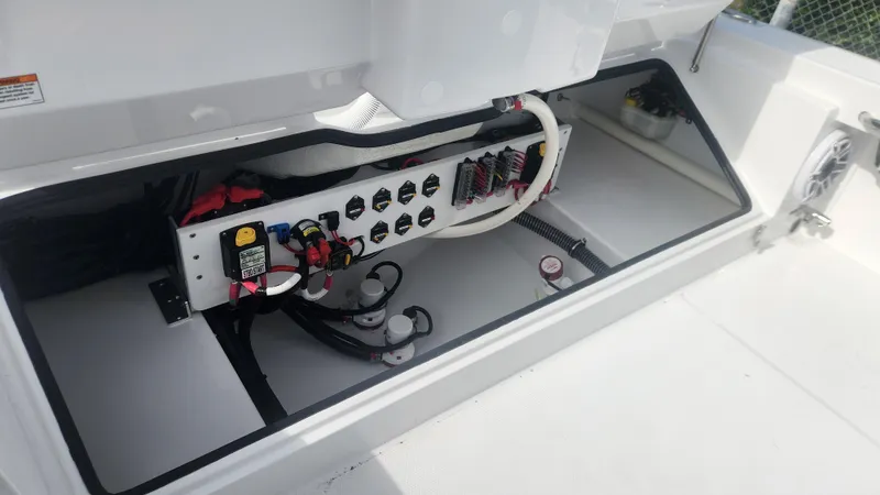  Yacht Photos Pics 2025 Everglades 253 Center Console boat electrical panel with wiring and components.
