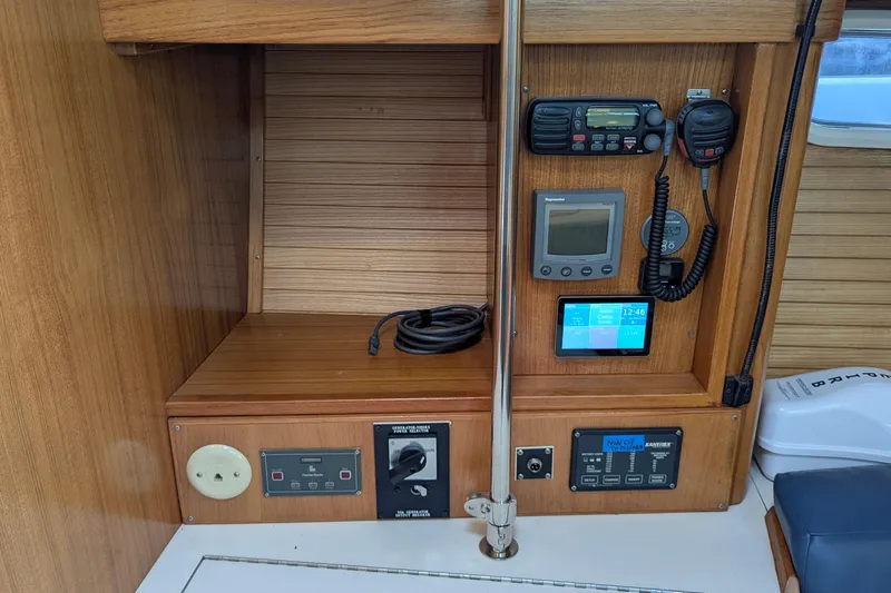 Alola Yacht Photos Pics 2003 Catalina 42 MkII yacht control panel with navigation and communication equipment.