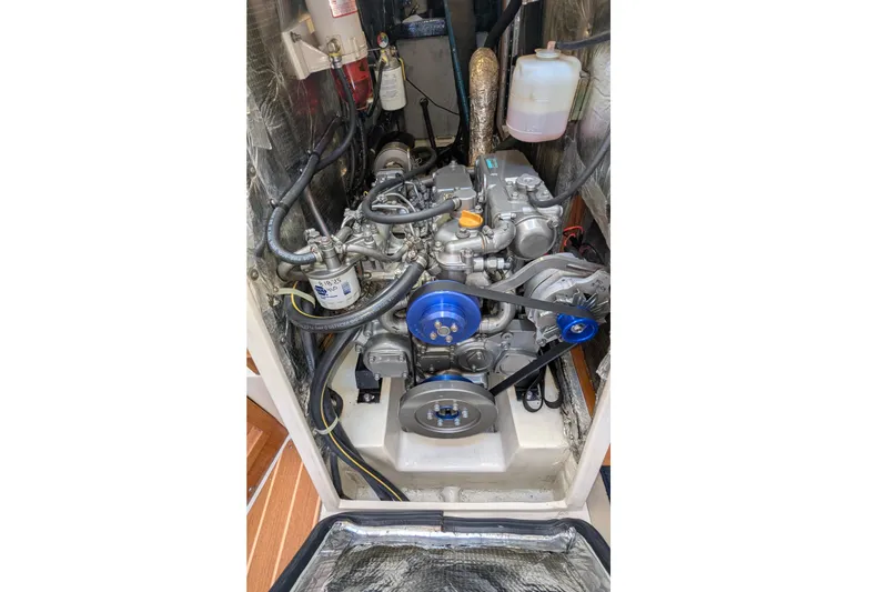 Alola Yacht Photos Pics Engine compartment of a 2003 Catalina 42 MkII sailboat, showcasing mechanical components.