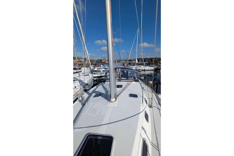 Alola Yacht Photos Pics 2003 Catalina 42 MkII sailboat docked in a marina under a clear blue sky.