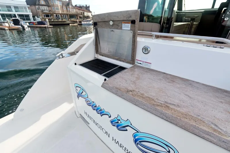 Pour It On Yacht Photos Pics 2017 Tiara Yachts C39 Coupe with outdoor kitchen, docked at Huntington Harbor.